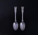 A pair of Victorian silver dessert spoons