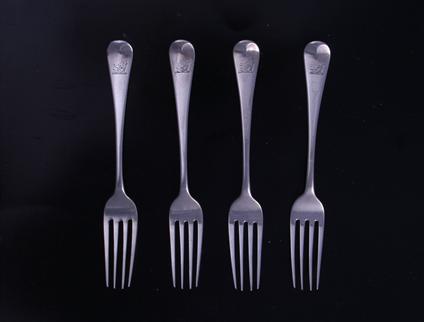 Four George III silver dessert forks