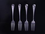 Four George III silver dessert forks