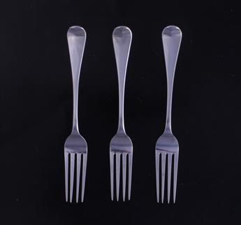 Three George IV armorial silver table forks