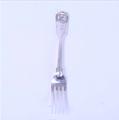 A Victorian sterling silver fiddle, thread and shell pattern table fork