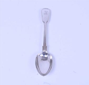 A Victorian sterling silver fiddle and thread pattern table spoon