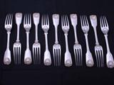 Set of eleven William IV fiddle, thread and shell pattern sterling silver table forks