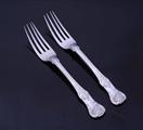 A pair of George IV Queen's pattern sterling silver dessert forks