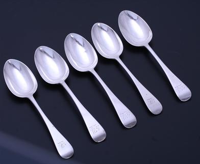 A set of five Victorian Old English pattern sterling silver dessert spoons