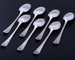 A set of seven Old English pattern sterling silver table spoons