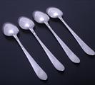 Set of four Irish George III sterling silver table spoons