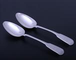 A pair of George IV sterling silver dessert spoons