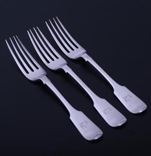 A set of three Victorian sterling silver table forks