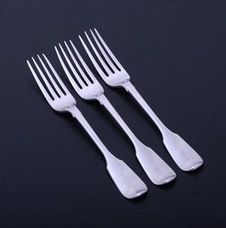 A set of three Victorian sterling silver fiddle pattern dessert forks