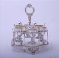 A fine Regency sterling silver egg cruet and frame