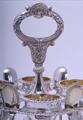 A fine Regency sterling silver egg cruet and frame