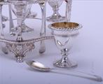 A fine Regency sterling silver egg cruet and frame