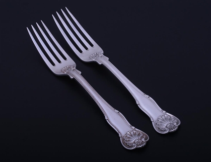 PAUL STORR: A fine pair of Regency King's Husk pattern sterling silver armorial table forks