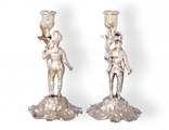 Exceptional and rare pair of Victorian heraldic silver gilt candlesticks