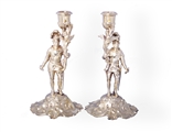 Exceptional and rare pair of Victorian heraldic silver gilt candlesticks