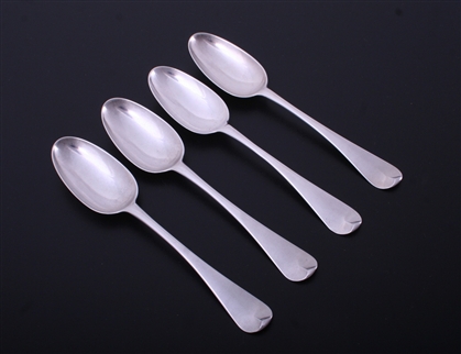 A set of four Hanoverian pattern sterling silver dessert spoons