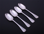 A set of four Hanoverian pattern sterling silver dessert spoons