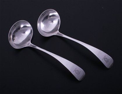 A pair of Victorian Old English pattern sterling silver sauce ladles