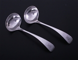 A pair of Victorian Old English pattern sterling silver sauce ladles