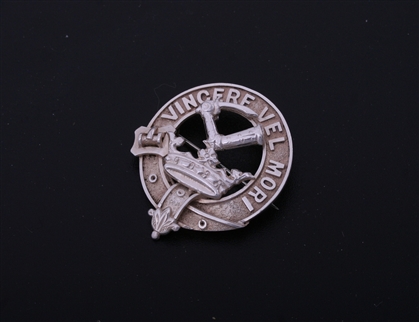 A Victorian sterling silver armorial badge