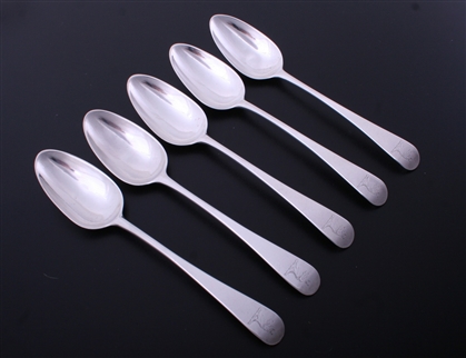 A set of five George III Old English pattern sterling silver table spoons