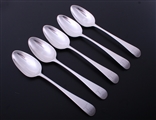 A set of five George III Old English pattern sterling silver table spoons