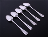 A set of five George III Old English pattern sterling silver table spoons