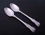 A good matched pair of King's pattern sterling silver basting spoons