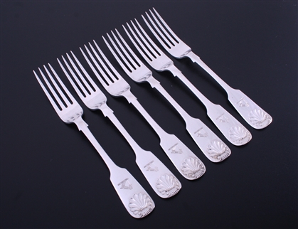 A set of six Scottish Victorian sterling silver fiddle and shell pattern table forks