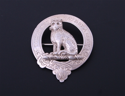 A Victorian Scottish sterling silver Clan badge for MACKINTOSH