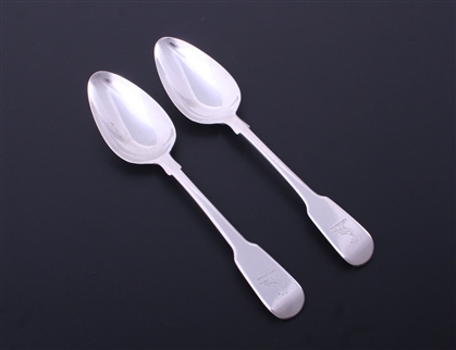 A pair of George III fiddle pattern sterling silver dessert spoons