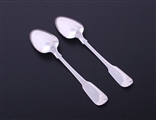 A pair of George III fiddle pattern sterling silver dessert spoons