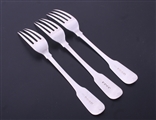 A set of three George IV fiddle pattern sterling silver table forks