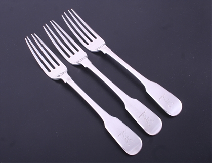 A set of three George IV fiddle pattern sterling silver table forks