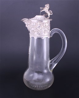 A Victorian silver mounted glass claret jug