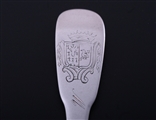 A matched set of six 18th century French provincial fiddle pattern armorial silver table spoons