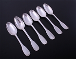 A matched set of six 18th century French provincial fiddle pattern armorial silver table spoons