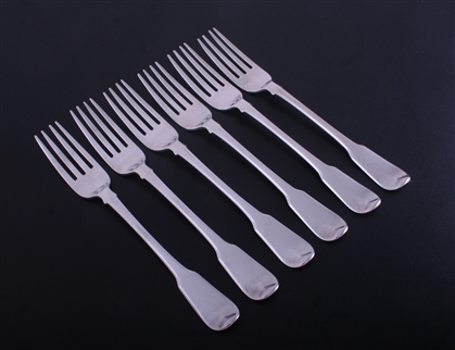 A set of six George III fiddle pattern sterling silver table forks