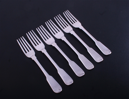 A set of six George III fiddle pattern sterling silver dessert forks