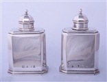 A fine pair of George II sterling silver octagonal tea caddies