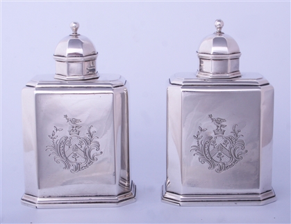 A fine pair of George II sterling silver octagonal tea caddies