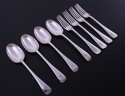 A set of eight Scottish Edwardian Old English pattern sterling silver dessert spoons and forks