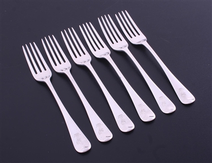 A set of six George III Old English pattern sterling silver dessert forks