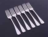 A set of six George III Old English pattern sterling silver dessert forks