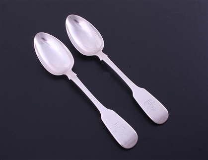 A pair of Victorian sterling silver fiddle pattern dessert spoons