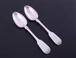 A pair of Victorian sterling silver fiddle pattern dessert spoons