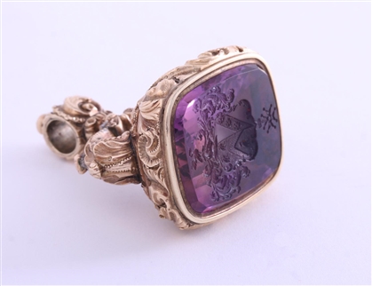 A magnificent and large gold and amethyst intaglio fob seal