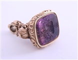 A magnificent and large gold and amethyst intaglio fob seal