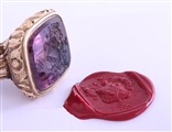 A magnificent and large gold and amethyst intaglio fob seal